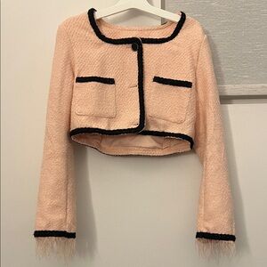 Chic Peach Cropped Jacket with Black Trim